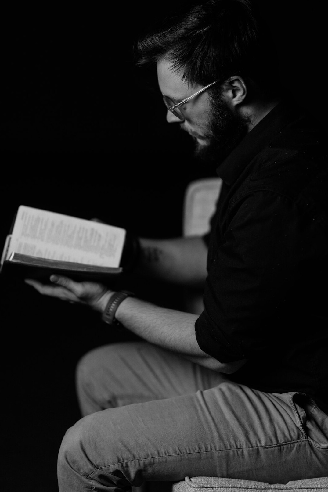Studio portrait of a male historian with glasses